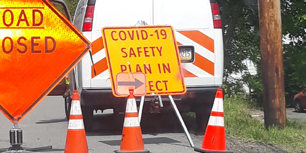 Pennsylvania road sign covid 19 safety plan in effect