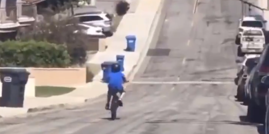 bike kid garbage cans phil collins