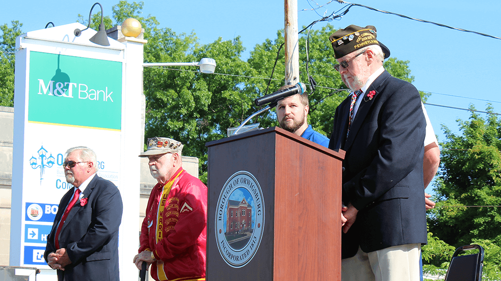 A moment of silence is observed during the 2022 Orwigsburg Memorial Day parade on May 30, 2022.