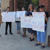 Activist group Schuylkill Indivisible protests outside US Rep. Dan Meuser's office in Pottsville, advocating for the raising of the country's debt ceiling to prevent default.