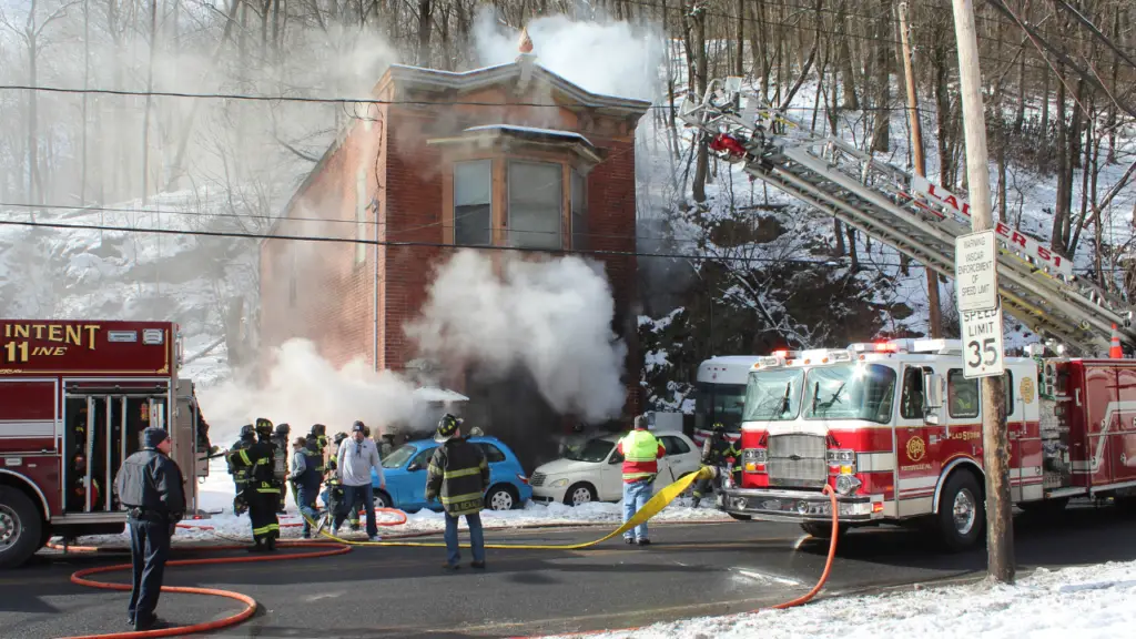 Heavy smoke poured from the former Mt. Carbon Fire Co. building as firefighters first arrived to the scene on Saturday afternoon. (Coal Region Canary photos)