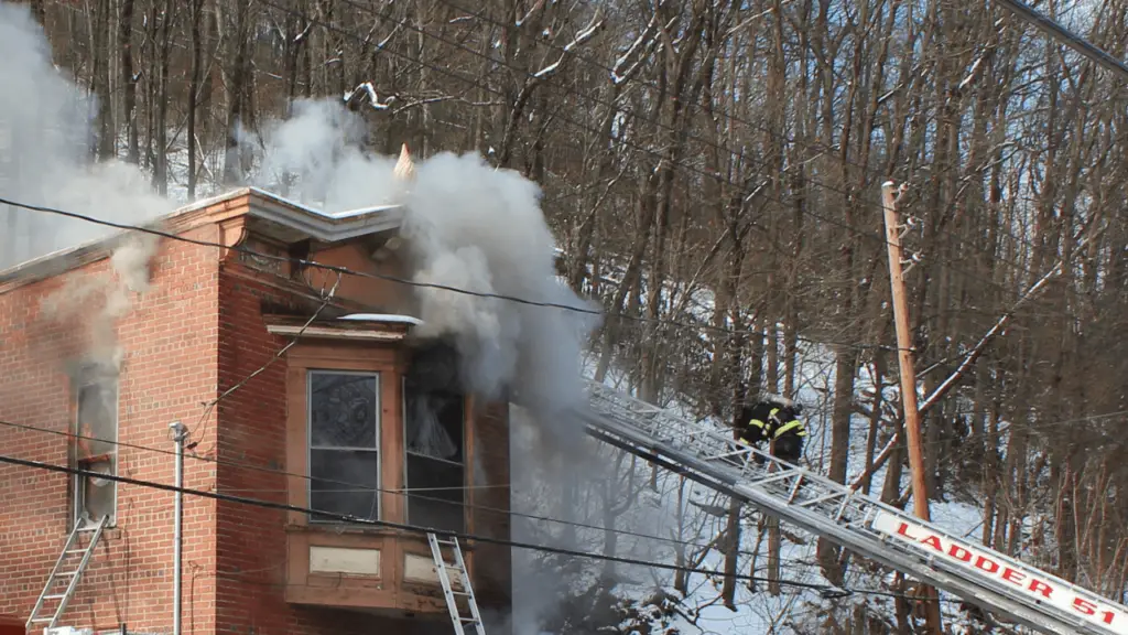 This Pottsville firefighter was on his way up the ladder when horns blared for all crews to evacuate the building. No injuries were reported during the fire response. No one was inside the building when flames broke out.