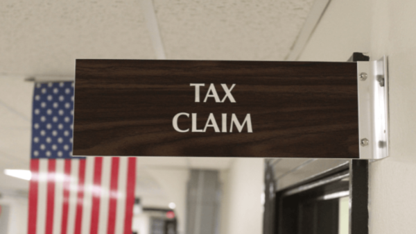 Two employees from Schuylkill County's Tax Claim office had their suspensions lifted after 942 days, it was announced on Wednesday.